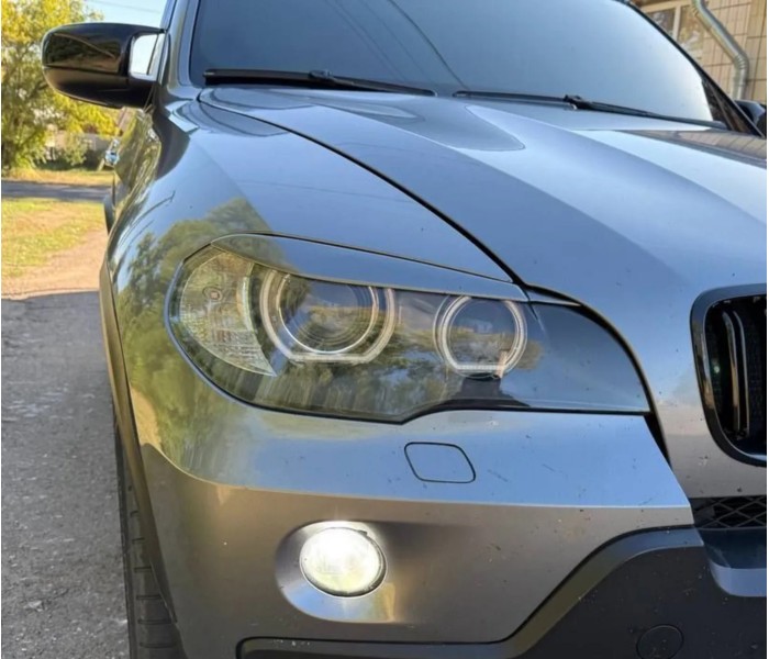 Накладки на фари, вії BMW X5 E70 під покраску ABS-пластик Накладки на фари, вії BMW X5 E70 під покраску ABS-пластик