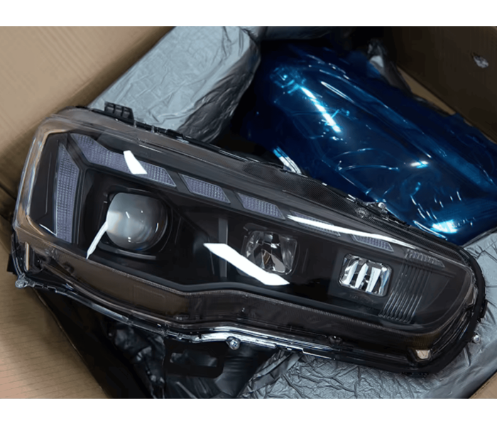 Оптика передняя, фары на Митсубиси Лансер 10