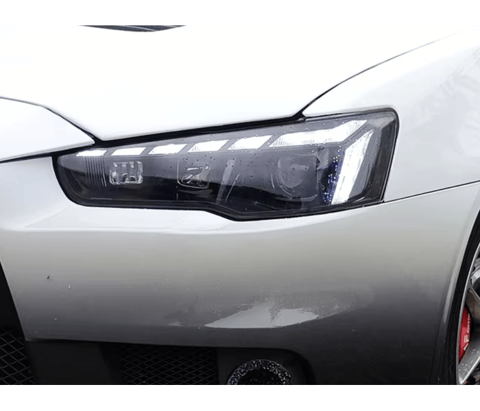 Оптика передняя, фары на Митсубиси Лансер 10